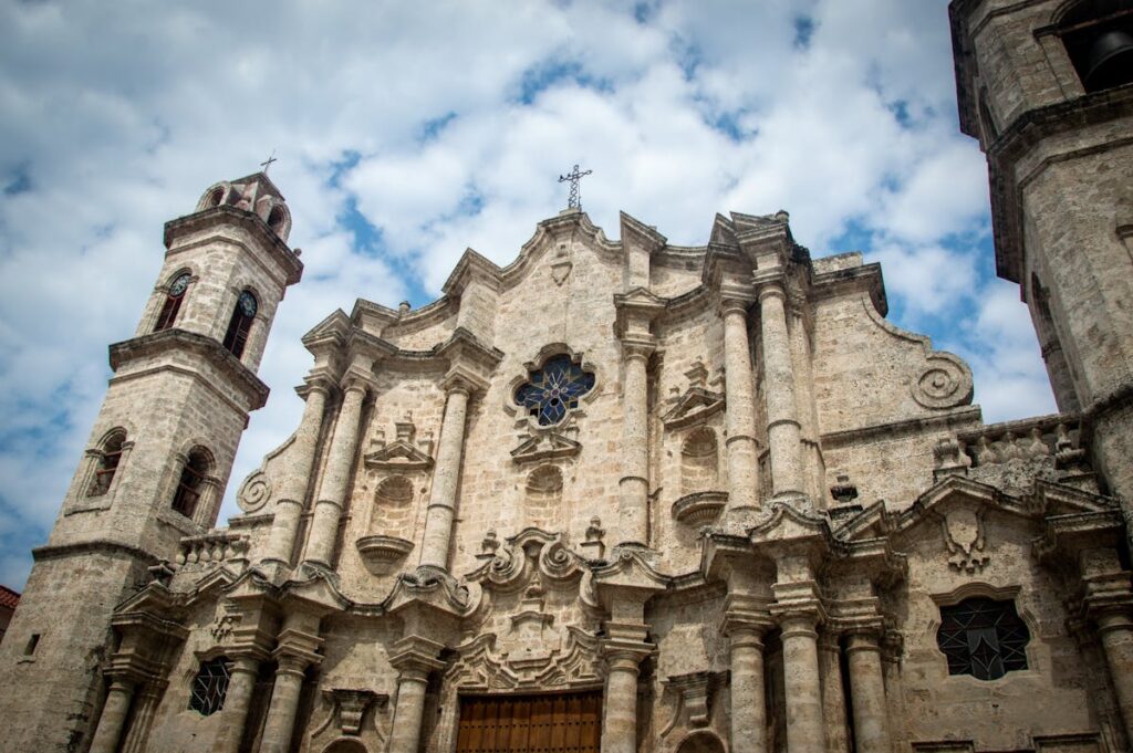 Havana Cathedral (La Catedral de la Virgen Maria) against dramatic clouds — Cuba